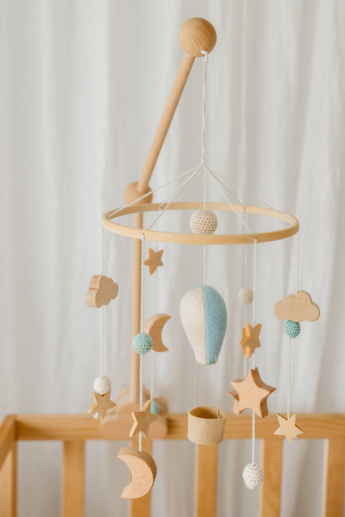 Blue balloon nursery mobile for baby crib in a soft neutral nursery by MacieLu.